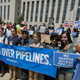 Shailene Woodley, from third left, filmmaker Josh Fox, Susan Sarandon, second from right, and Standing Rock Sioux Tribe member Bobbi Jean Three Lakes, right, join a rally outside US District Court in Washington in August in solidarity with the Standing Rock Sioux Tribe. Photo via AP